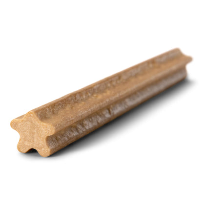 Wooden dog chew toy on a white background