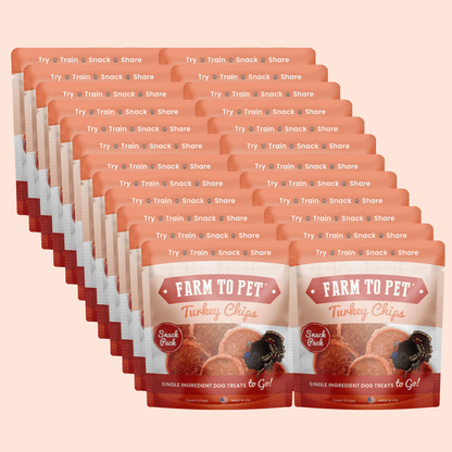 Multiple packages of Farm to Pet Turkey Chips on a beige background