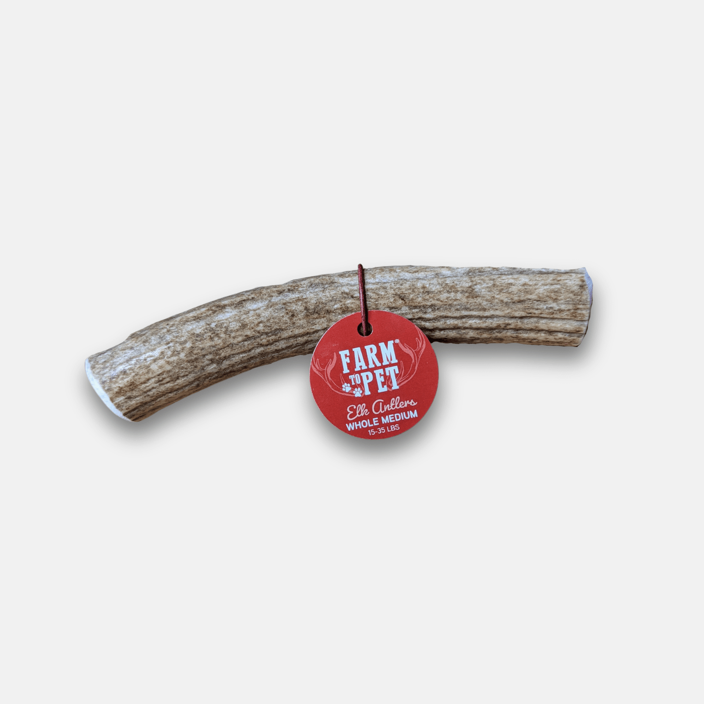 Rawhide bone with a 'Farm to Pet' label on a white background