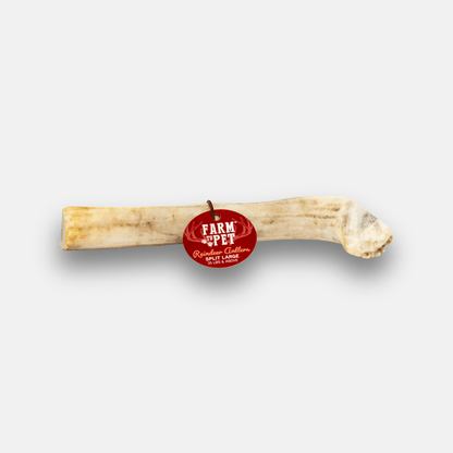 Dog chew treat with 'Farm to Pet' label on a white background