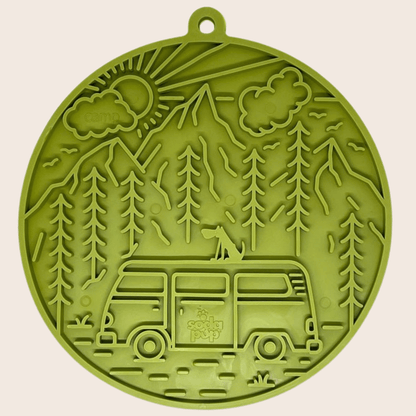 Green silicone mold with camping design featuring a van and trees on a beige background