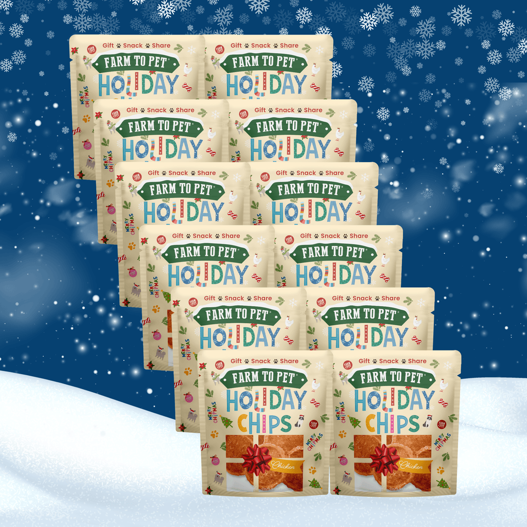 Multiple packages of 'Farm to Pet Holiday' chips on a snowy background