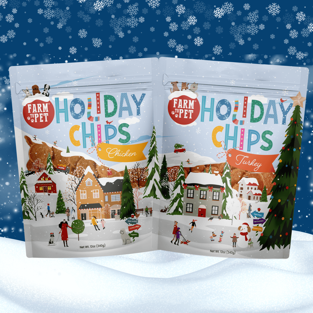 Two packages of 'Farm to Pet Holiday Chips' on a snowy background with Christmas-themed illustrations.