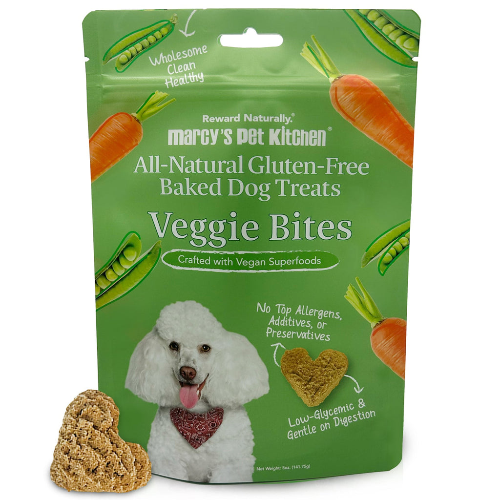 Green package of marcy's pet kitchen veggie bites dog treats with a white dog on the label.