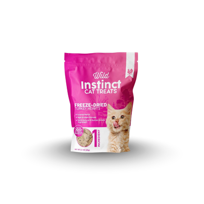 Pink package of Wild Instinct cat treats on a white background