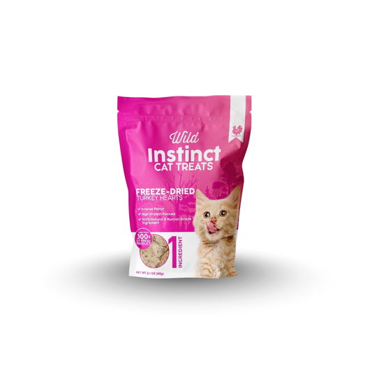 Pink package of Wild Instinct cat treats on a white background