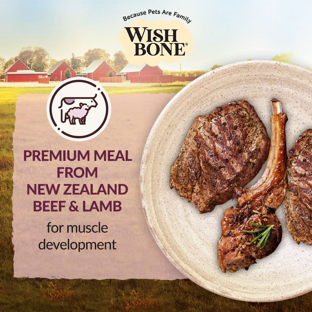 Wish Bone pet food packaging with meat on a plate and farm background