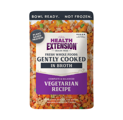 Health Extension dog food pouch with colorful ingredients on a white background