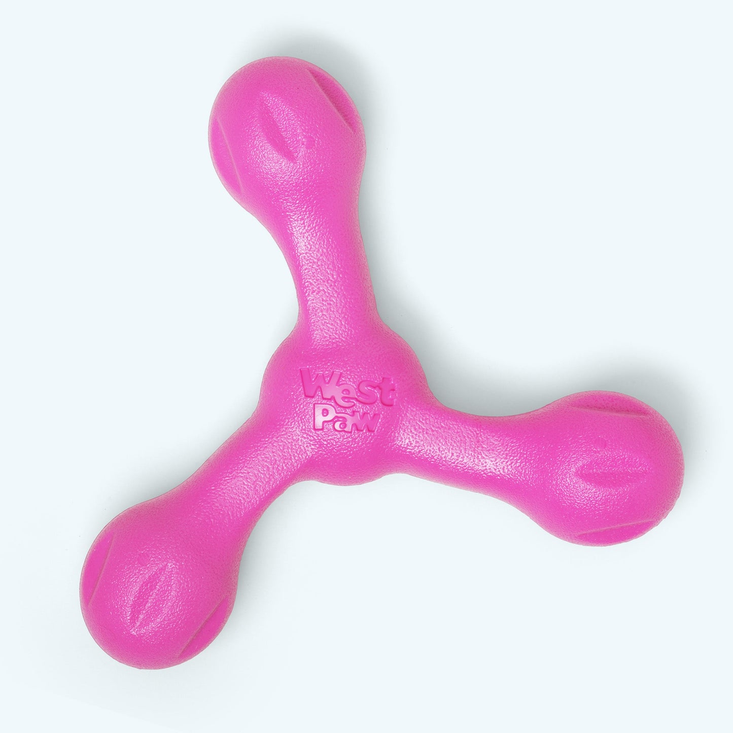 Pink dog toy with 'Woof Bar' branding on a white background