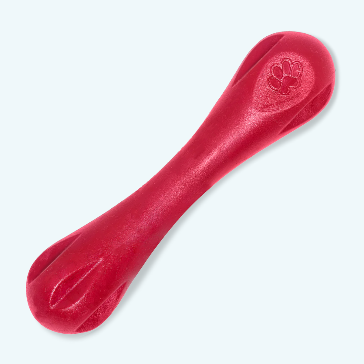 Red dog toy with a paw print design on a white background