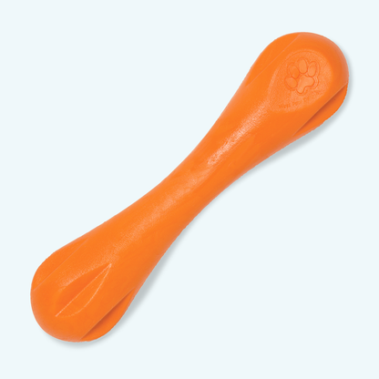 Orange dog toy with a paw print design on a white background