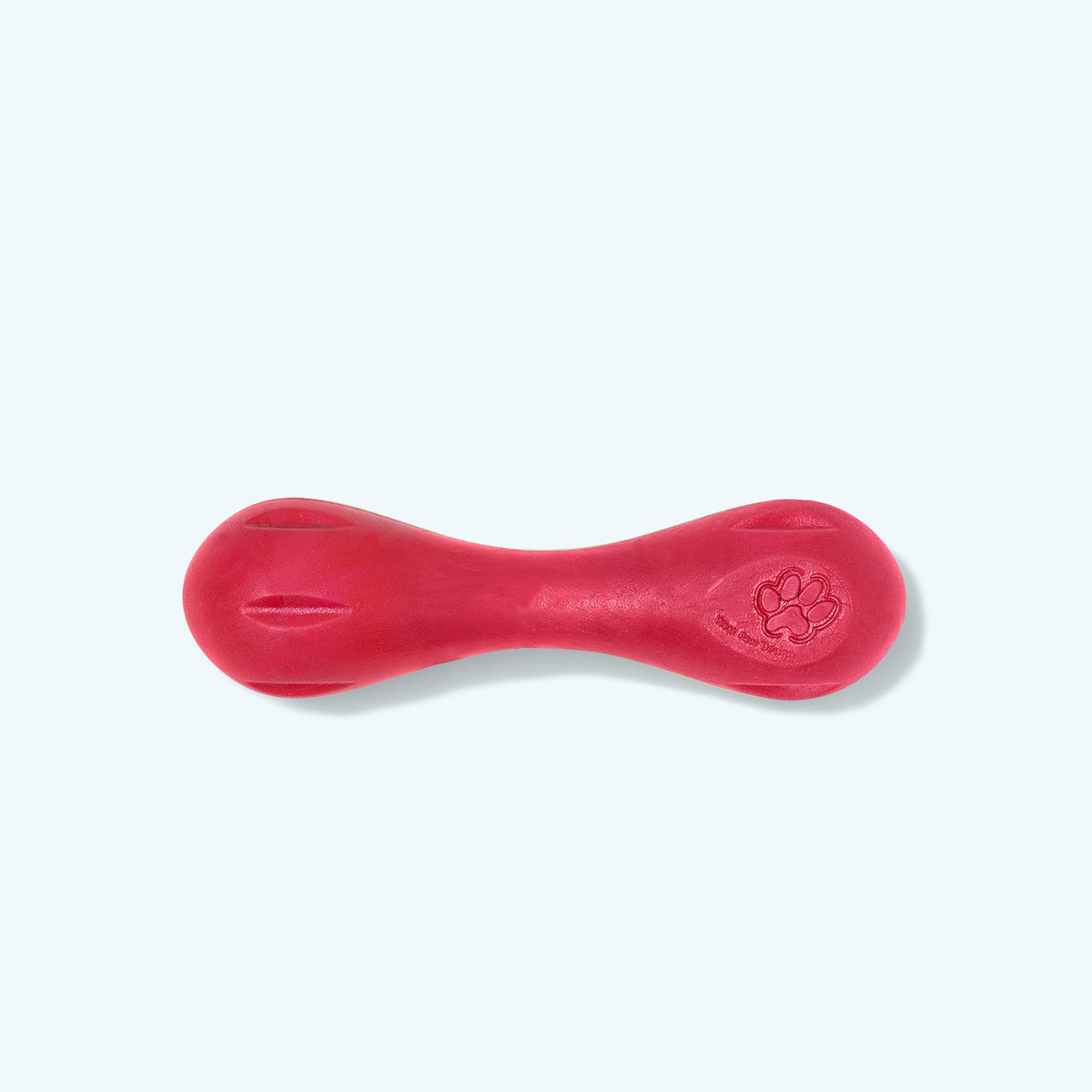 Red dog toy with a paw print on a white background