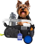 Dog stroller caddy with a dog inside, including a water bottle, pet bowl, and other accessories on a white background.