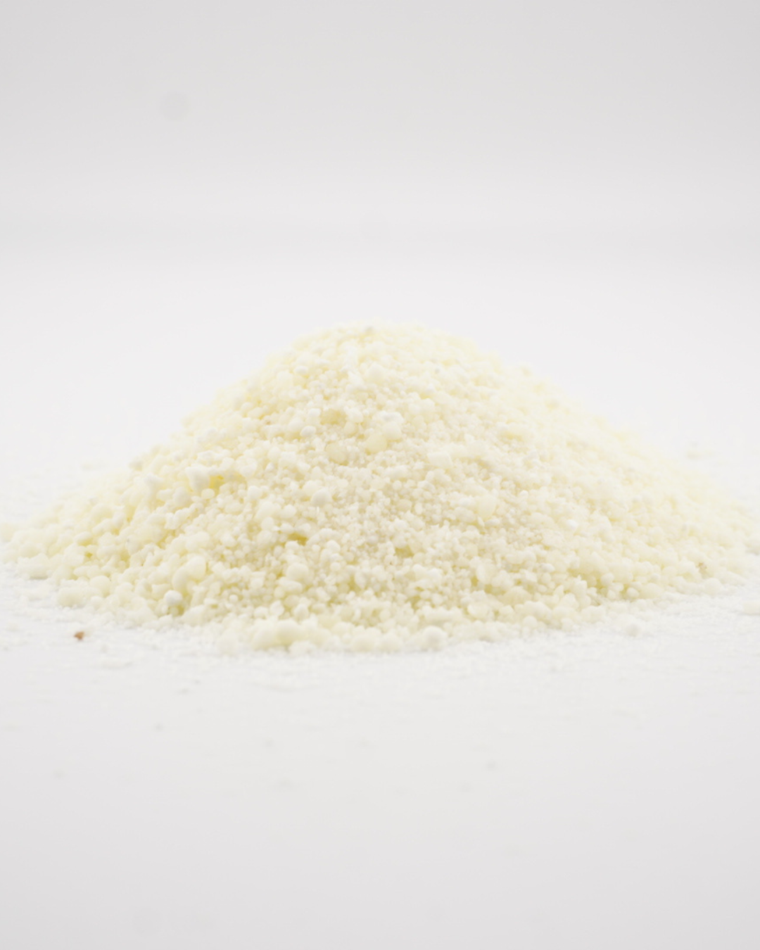 Plant based cassava cat litter poured out to show the mixed granule size