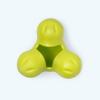 Green rubber dog toy on a white background