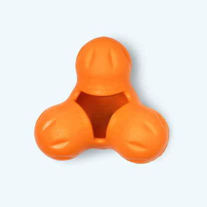 Orange plastic tool on a white background