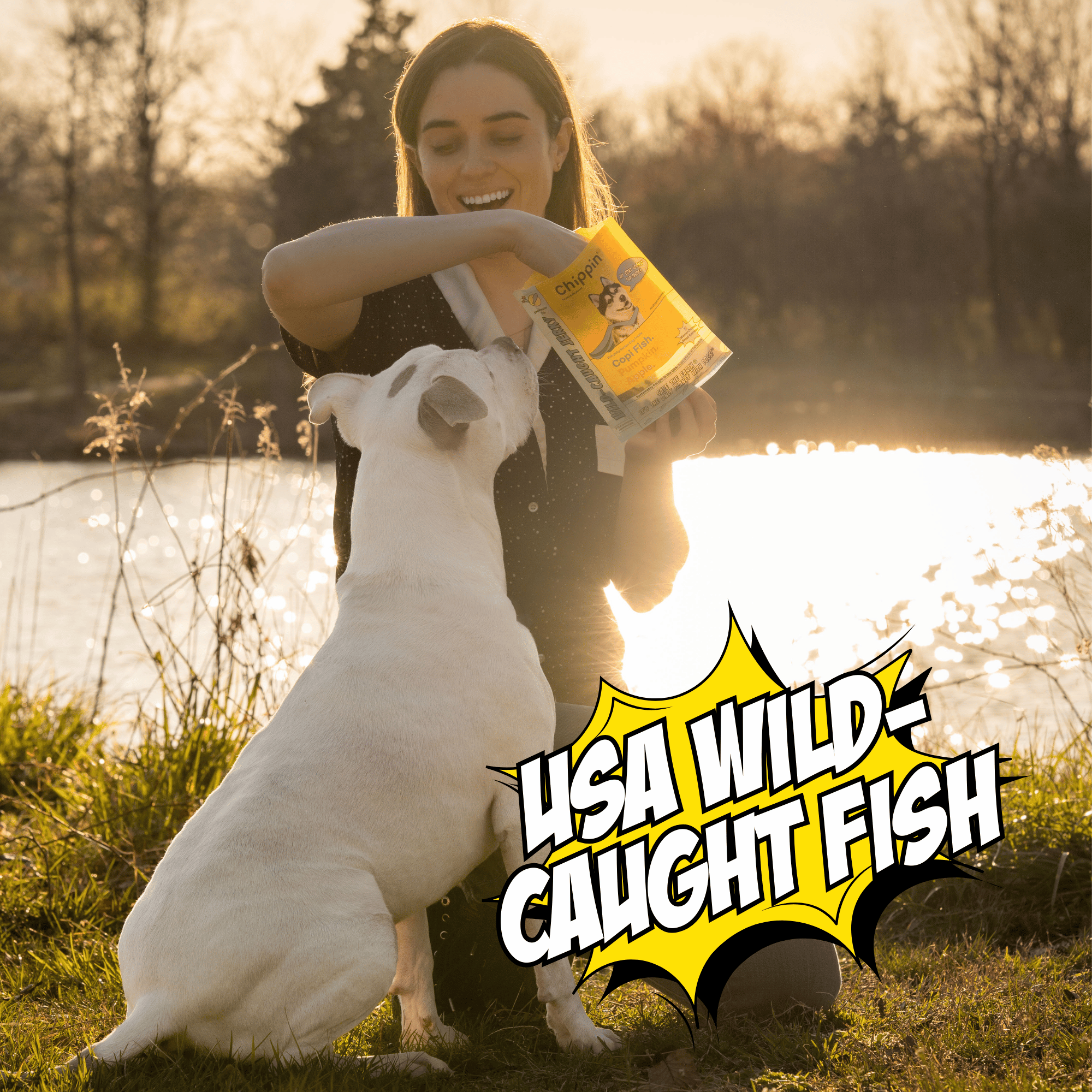 Woman holding a bag of dog food with a dog by a lake, featuring 'USA Wild Caught Fish' text.