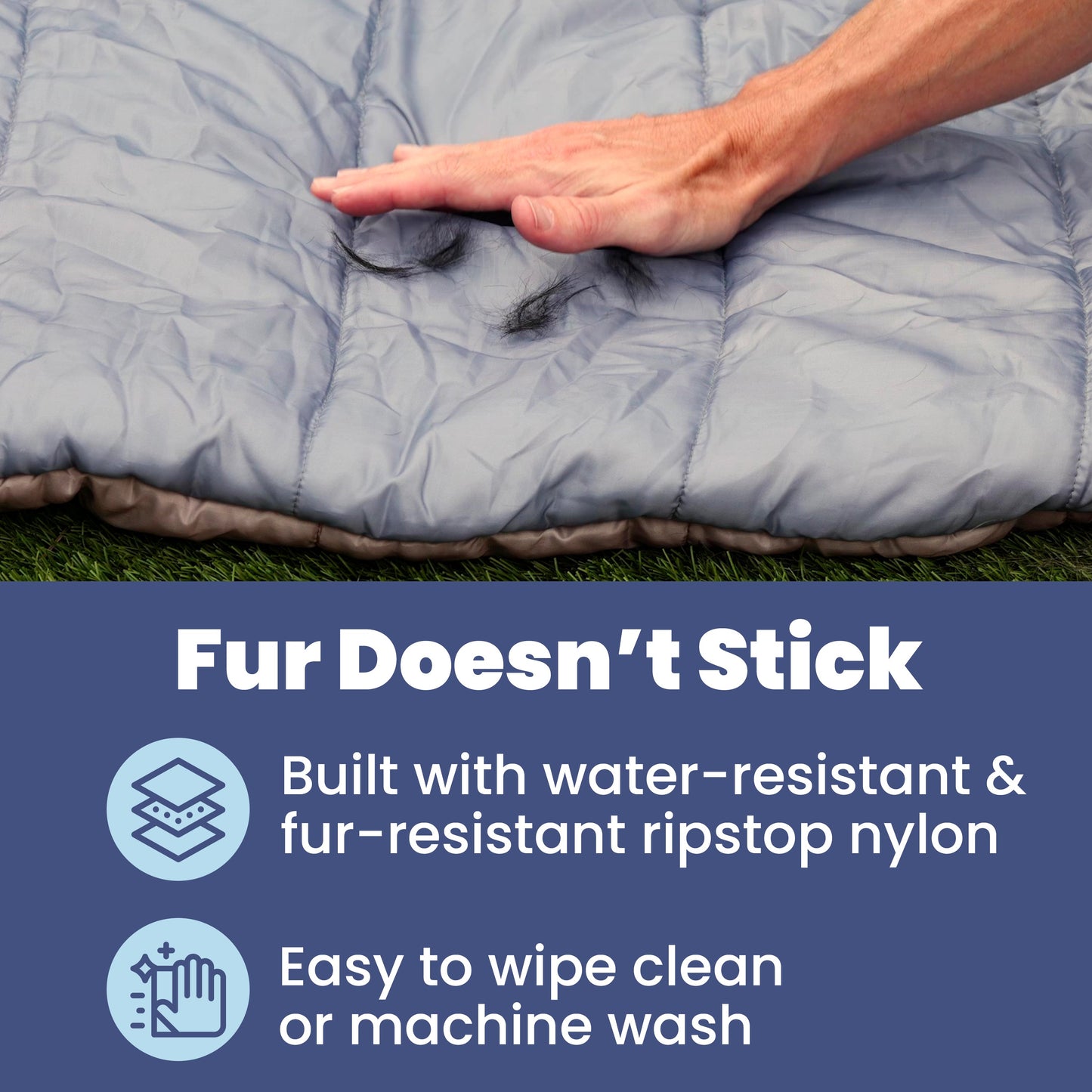 Person touching a gray quilt with text about water-resistant and fur-resistant properties.