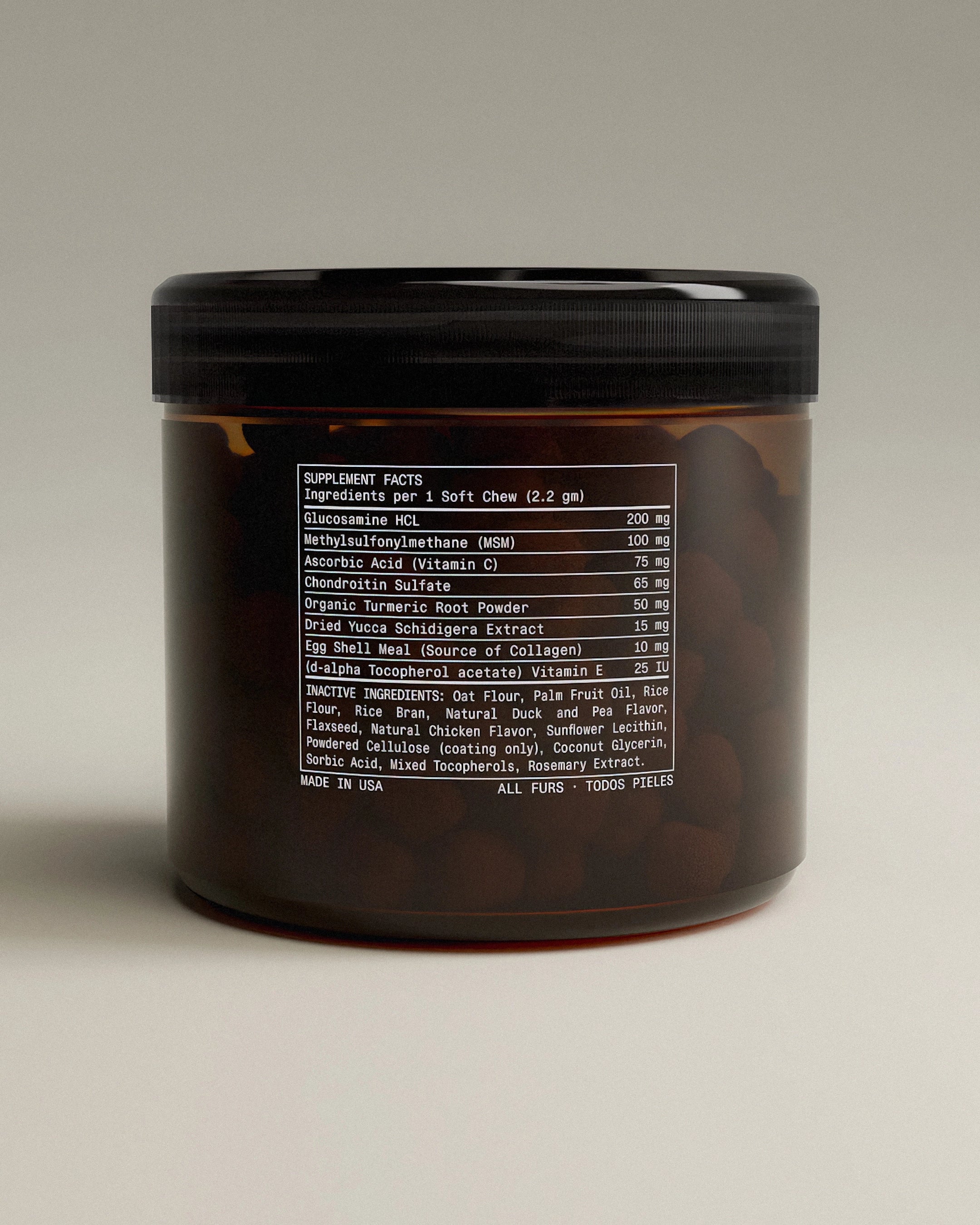 Brown supplement jar with label on a beige background