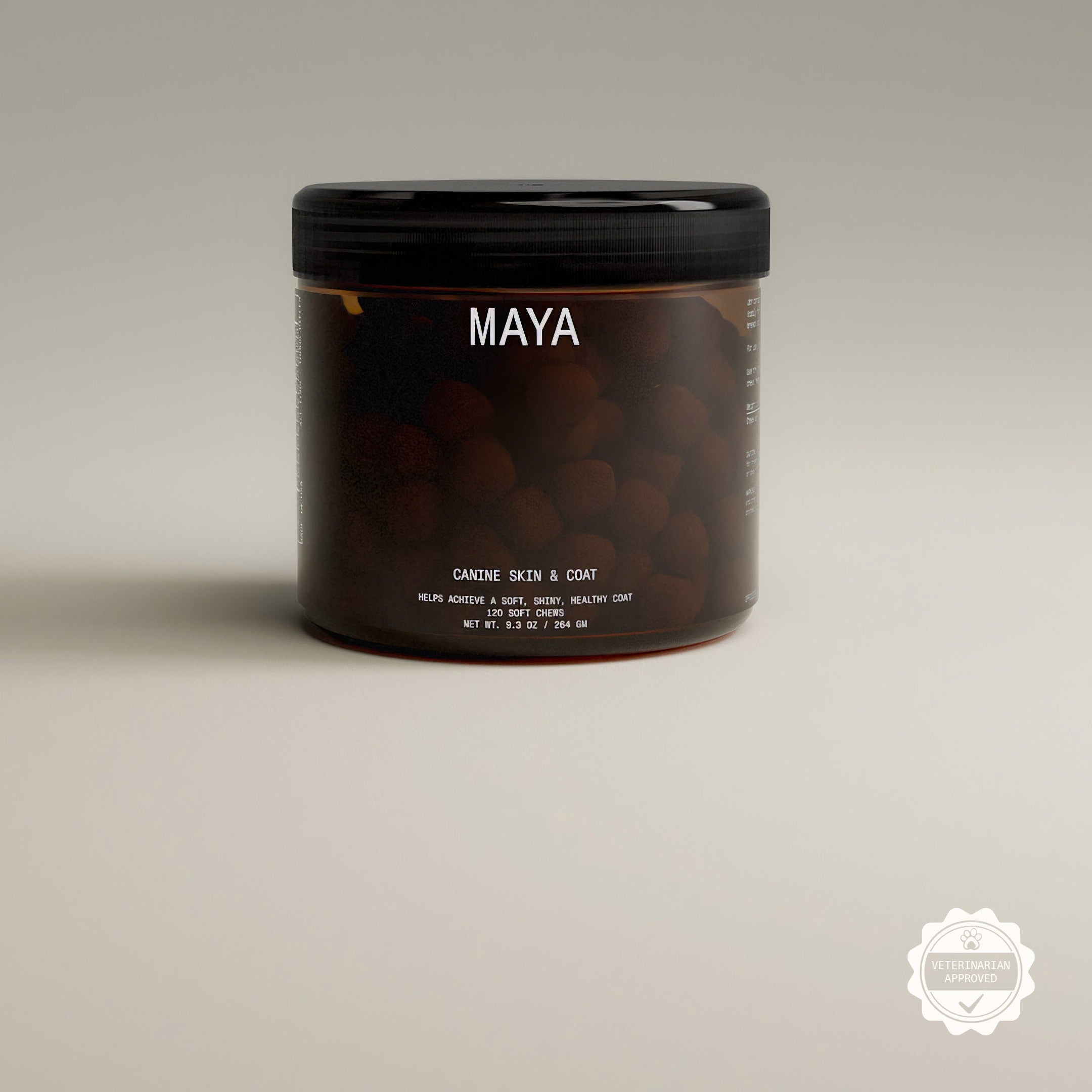 Brown jar with black lid labeled 'Maya' on a beige background