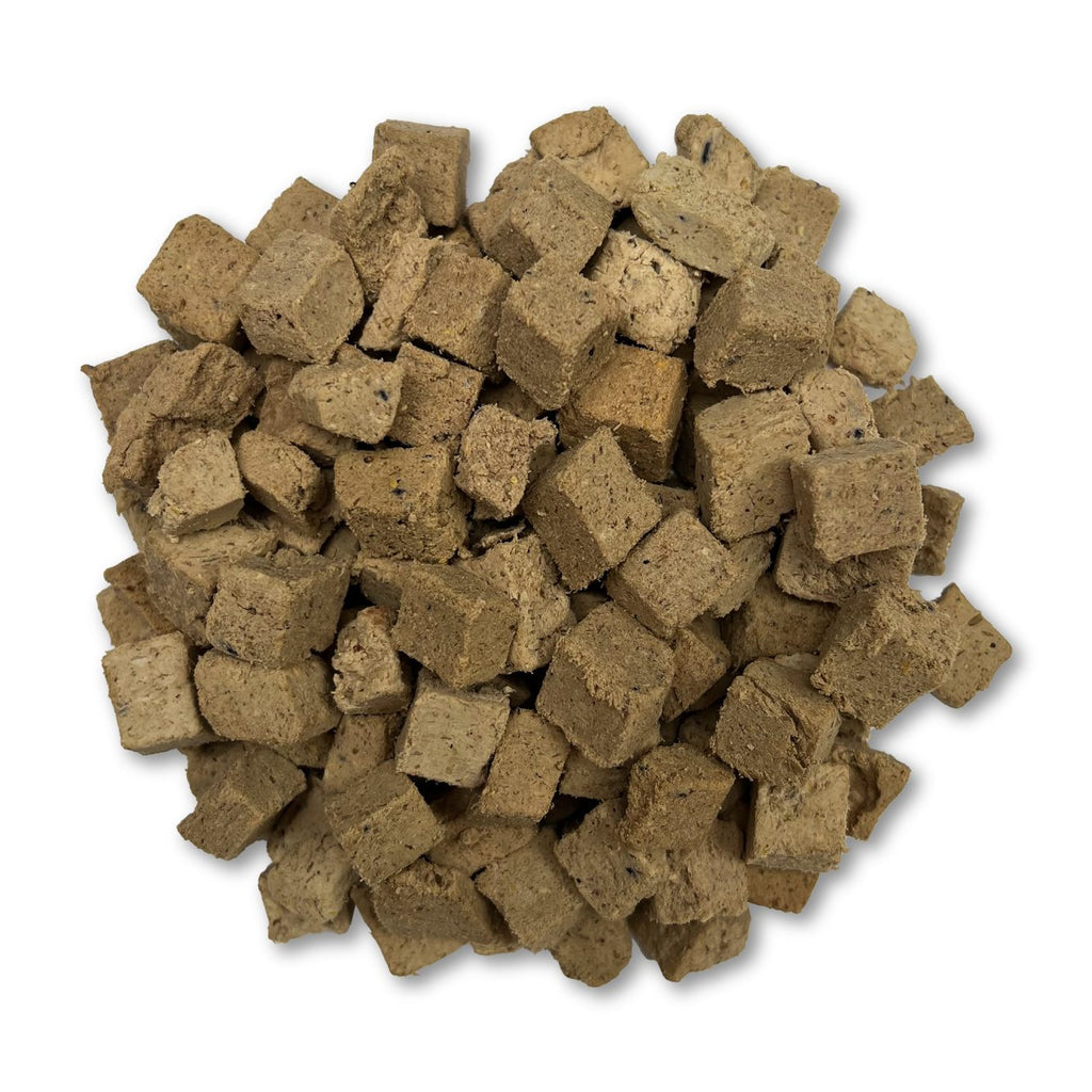 Brown square-shaped pet treats on a white background