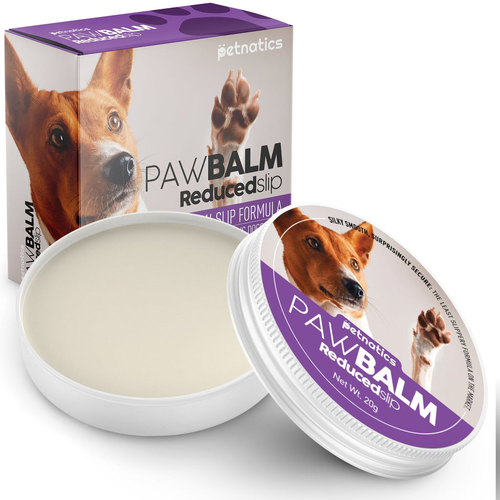 Petnatics Paw Balm Reduced Slip for dogs with packaging and balm container on a white background