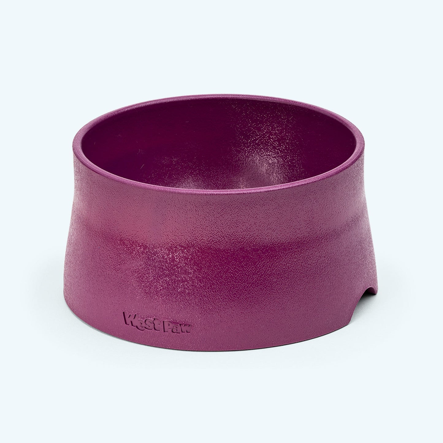 Purple pet bowl with 'West Paw' branding on a white background