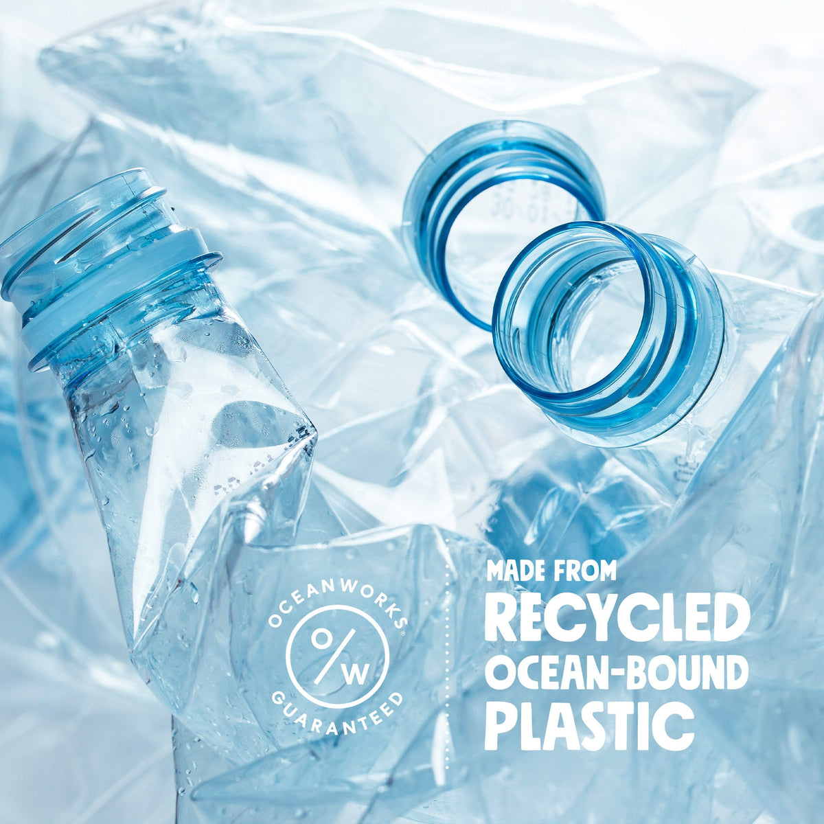 Recycled plastic bottle with blue cap on a textured blue background, featuring 'Oceanworks' branding.