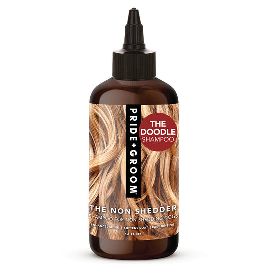 Bottle of Pride Groom The Non Shedder Shampoo on a white background