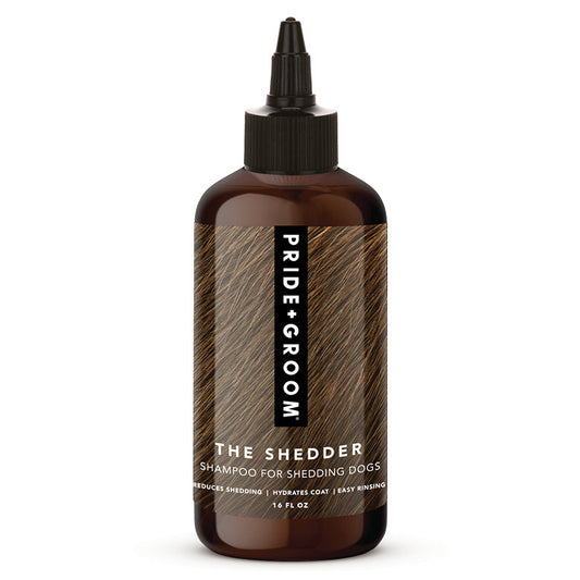 Dog shampoo bottle labeled 'The Shedder' by Pride Groom on a white background