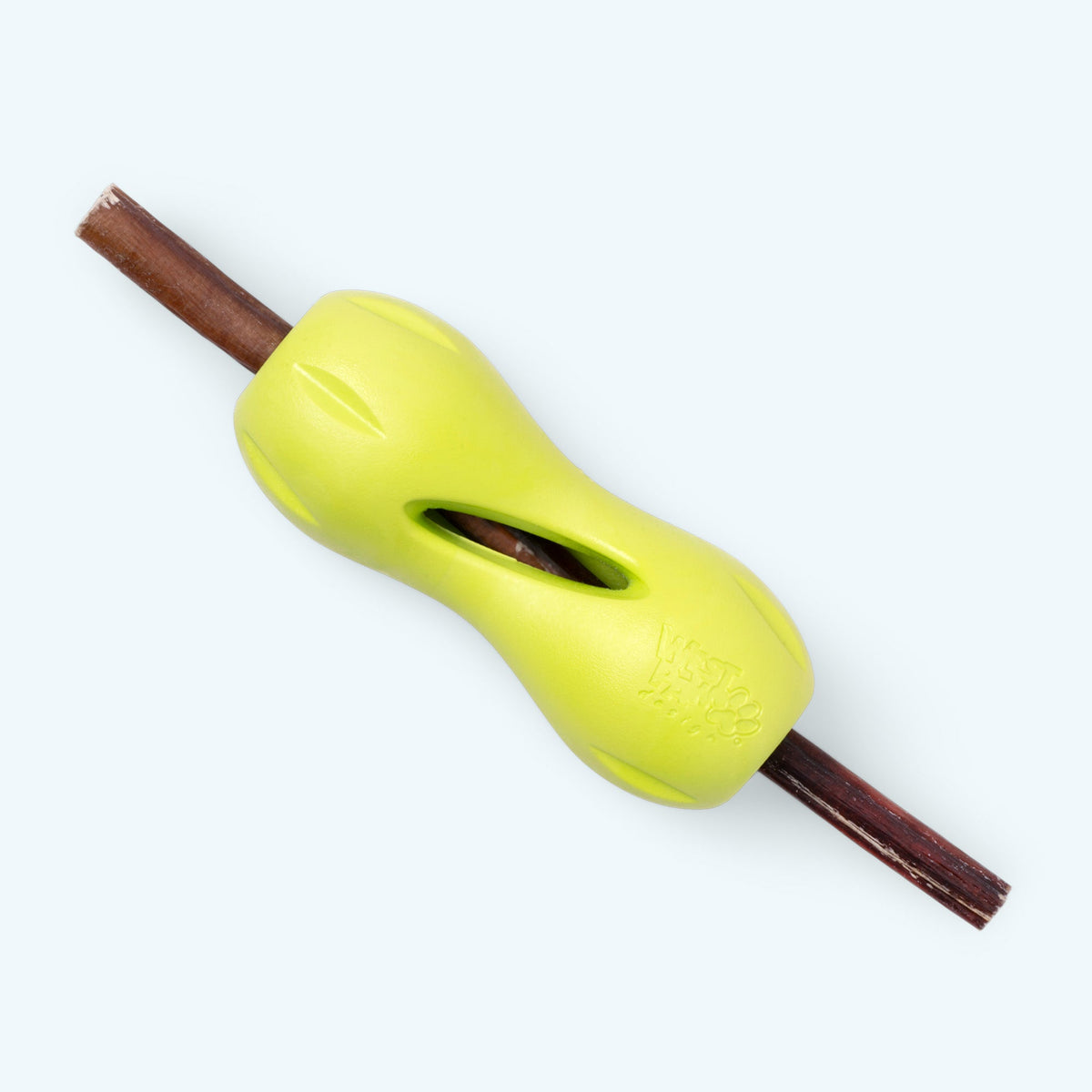 Yellow dog chew toy with a wooden stick on a white background