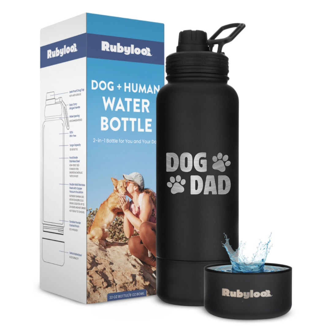 Black water bottle with 'Dog Dad' text and Rubyloo packaging on a white background
