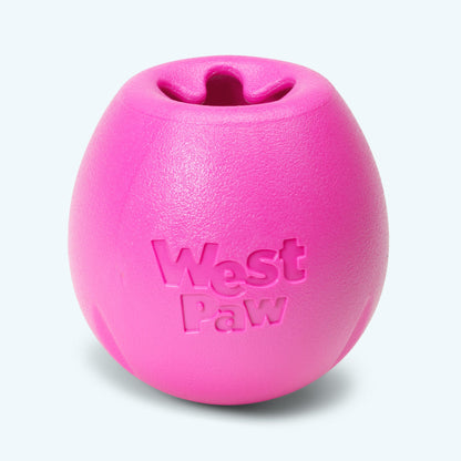 Pink dog toy with 'West Paw' branding on a light gray background