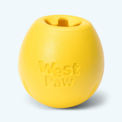 Yellow dog toy with 'West Paw' branding on a light gray background