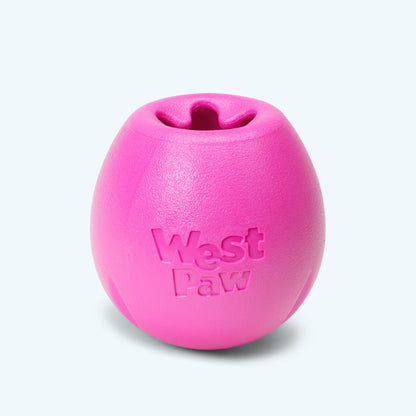 Pink dog toy with 'West Paw' branding on a light gray background