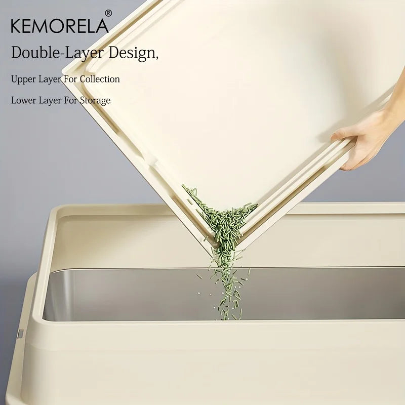 Komorela double-layered collection and storage bin with a hand lifting the top layer.