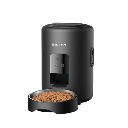 Black pet food dispenser with a bowl of kibble on a white background, featuring the Rojeco brand.