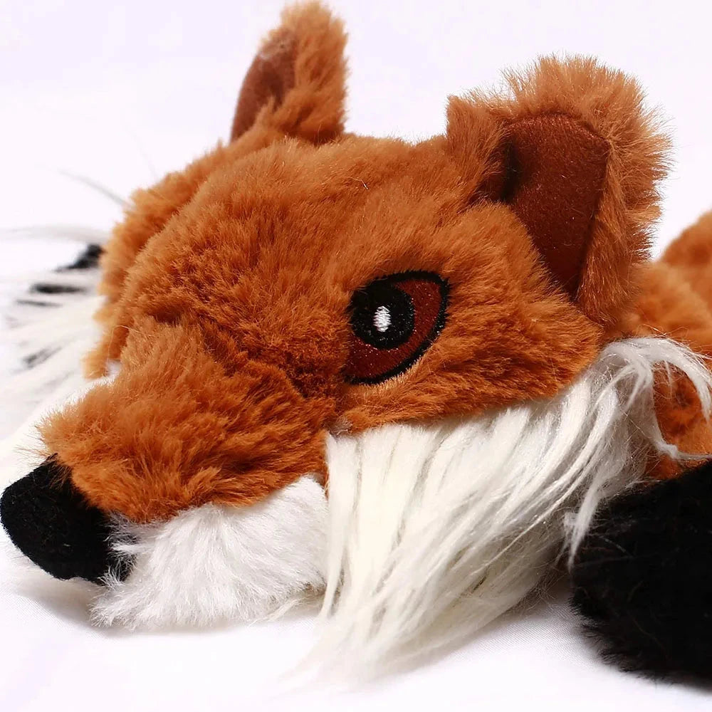 Close-up of a plush fox toy with a white background