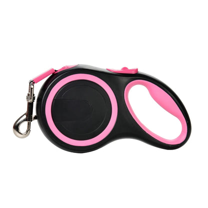 Black and pink retractable dog leash on a white background