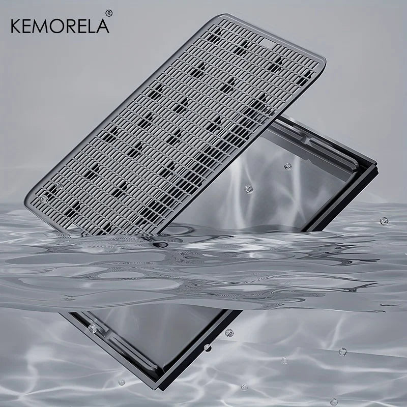 Metallic grating with water reflection on a gray background, featuring the brand 'KEMORELA'.