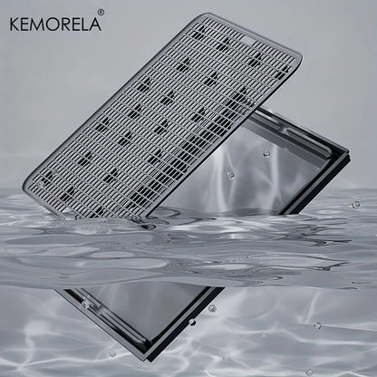 Metallic grating with water reflection on a gray background, featuring the brand 'KEMORELA'.