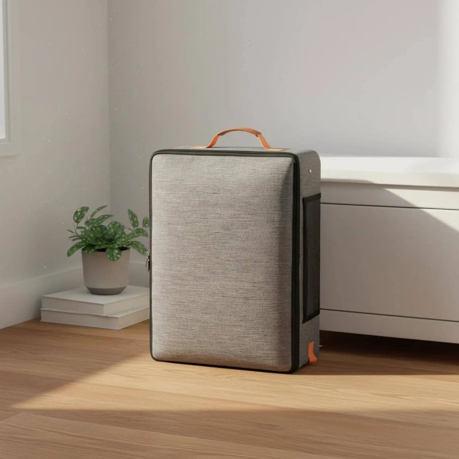 Modern rectangular trash can with a handle on a wooden floor.