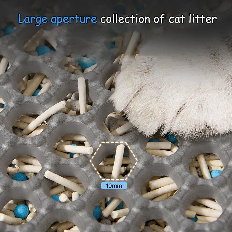 a cat litter mat with a text and cat paw.
