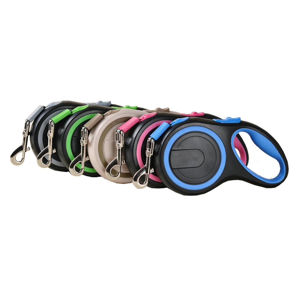 Set of colorful retractable dog leashes on a white background