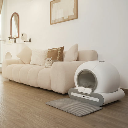 cat litter box with waste bin in a living room setting, showing space efficiency.