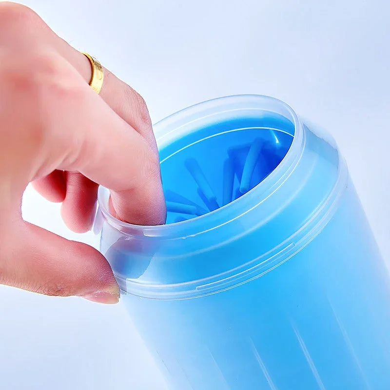 Hand opening a blue container with a white background