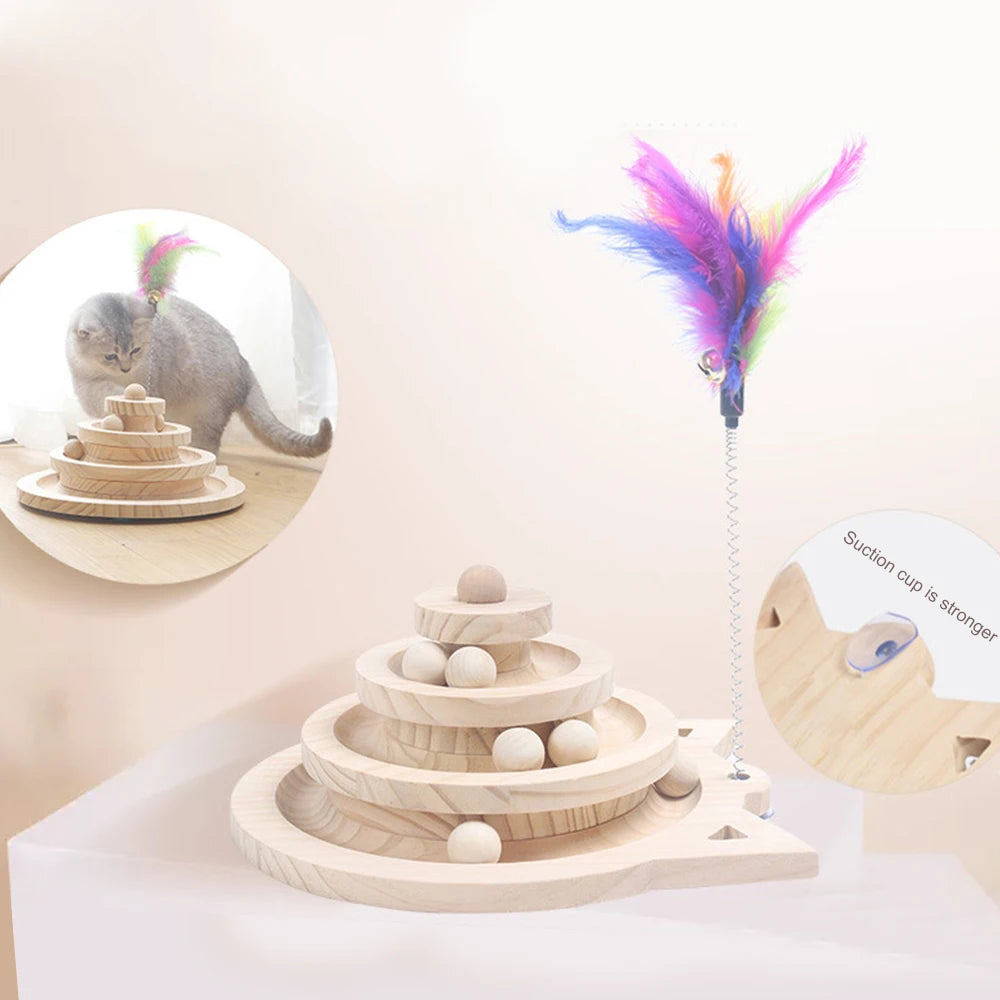 A cat toy with balls and feather.