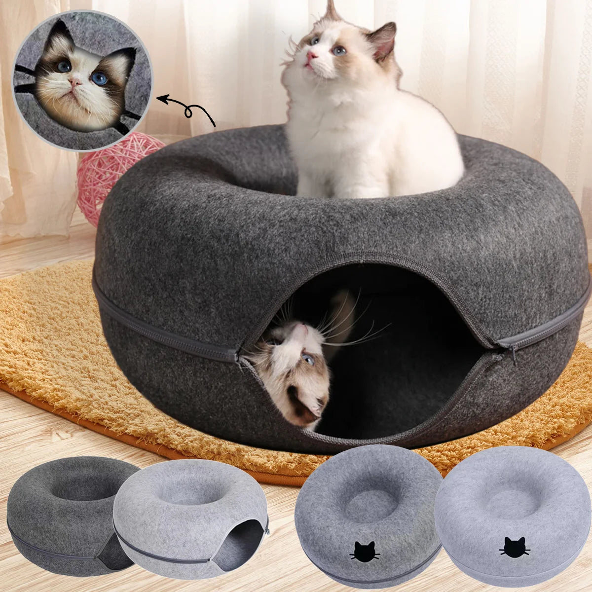 Cat bed with two cats inside, one peeking out, on a wooden floor.