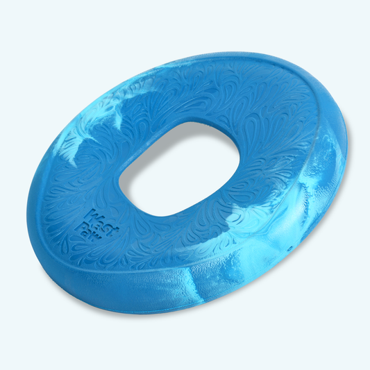 Blue plastic seat cover with floral pattern on a light gray background