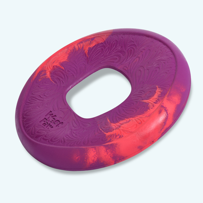 Purple and red textured object on a light gray background